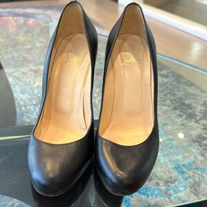 Louboutin black pumps
